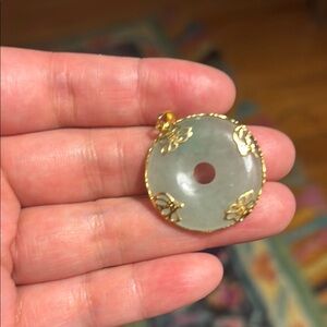 Jade and gold pendent
